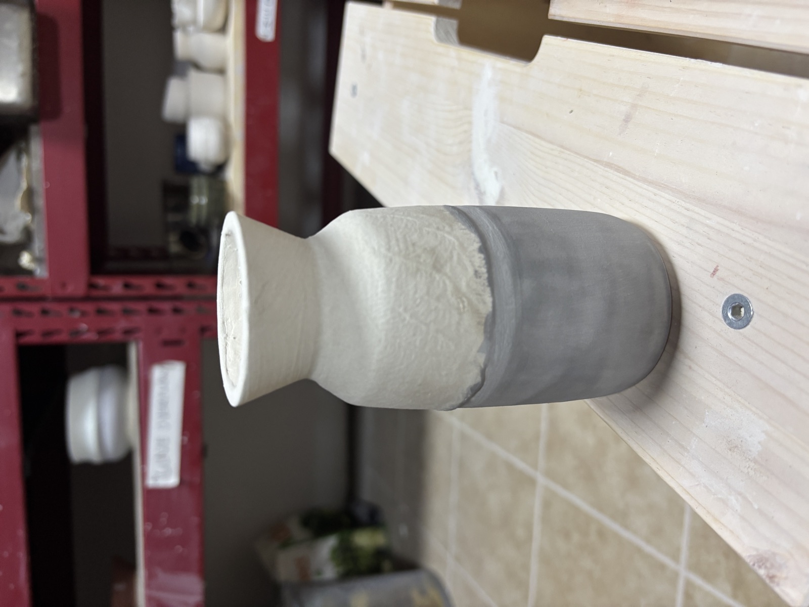 Two-tone vase, white top and dark bottom